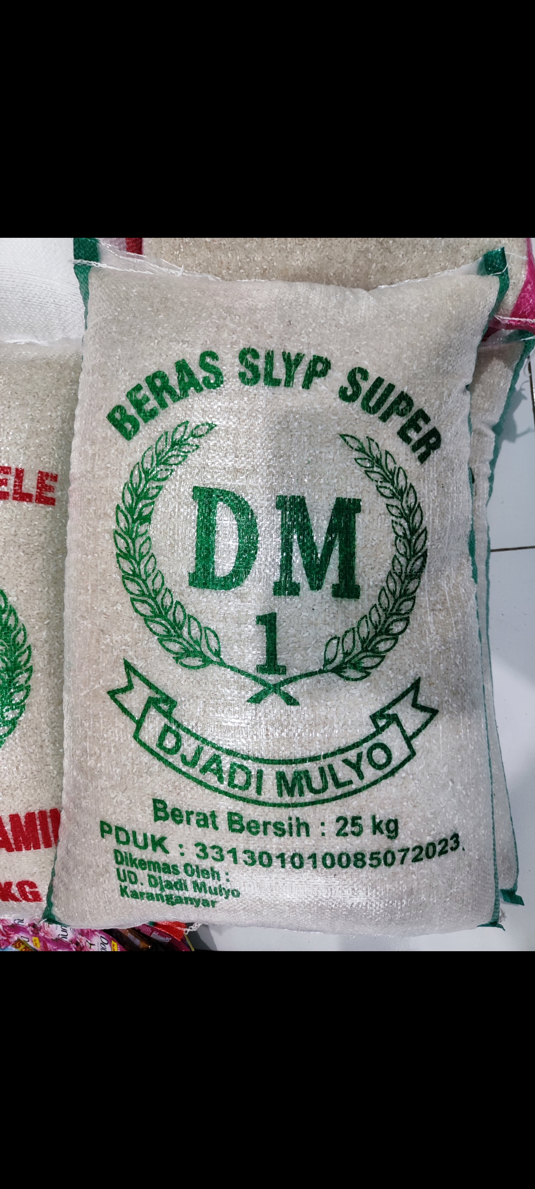 Beras DM 1 (Per Kg)
